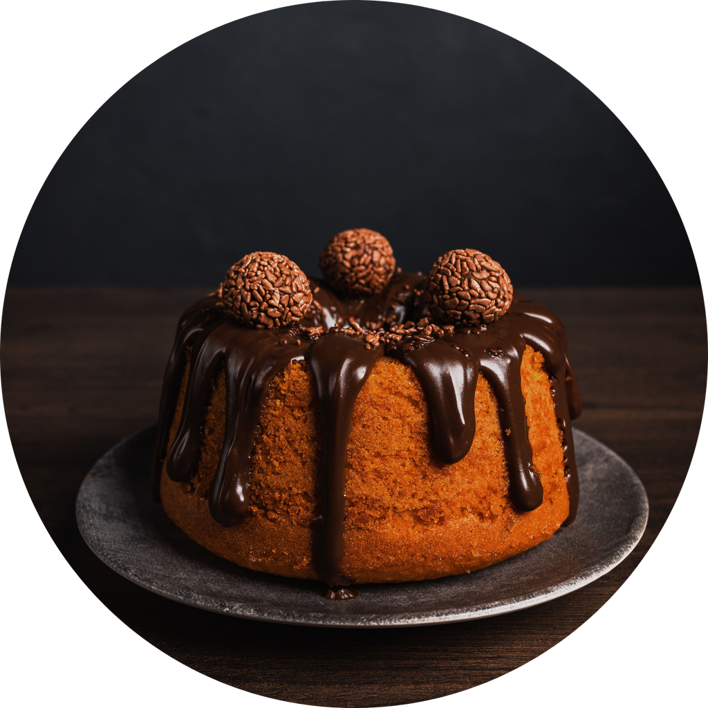 Homemade chocolate cake topped with creamy frosting